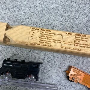 Train whistles and toy train car